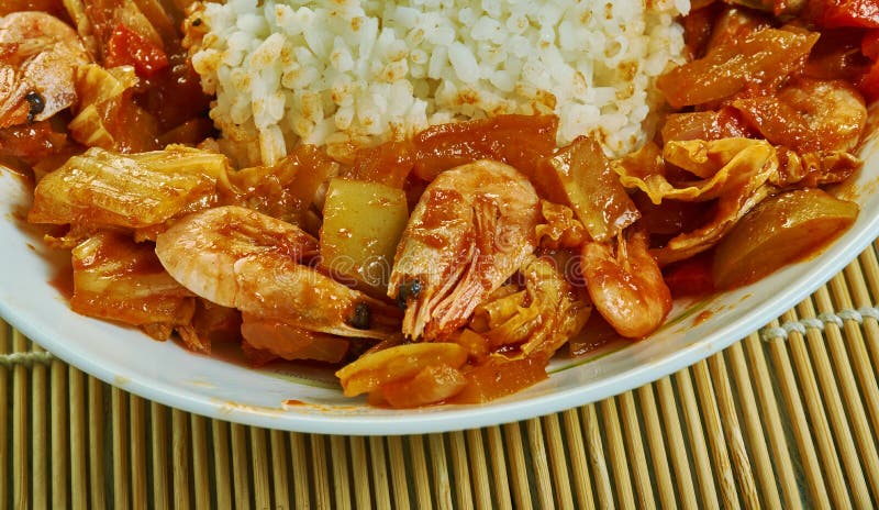 Etouffee  dish found in both Cajun and Creole cuisine typically served with shellfish over rice