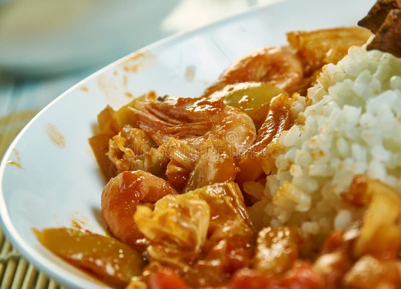 Etouffee  dish found in both Cajun and Creole cuisine typically served with shellfish over rice