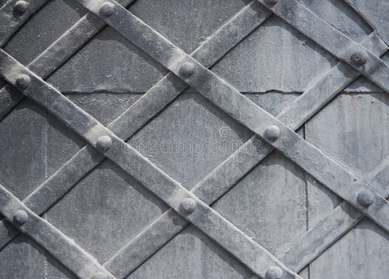 Ett fragment av en gammal trädörrgrå färg Texturera bakgrund royaltyfri fotografi Ett fragment av en gammal trädörrgrå färg Texturera bakgrund royaltyfri fotografi