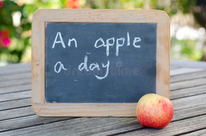 Ett äpple om dagen…, arkivbild Ett äpple om dagen…, arkivbild