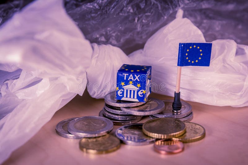 EU map with euro coins and a plastic bag symbolizing european plastic tax regulation.