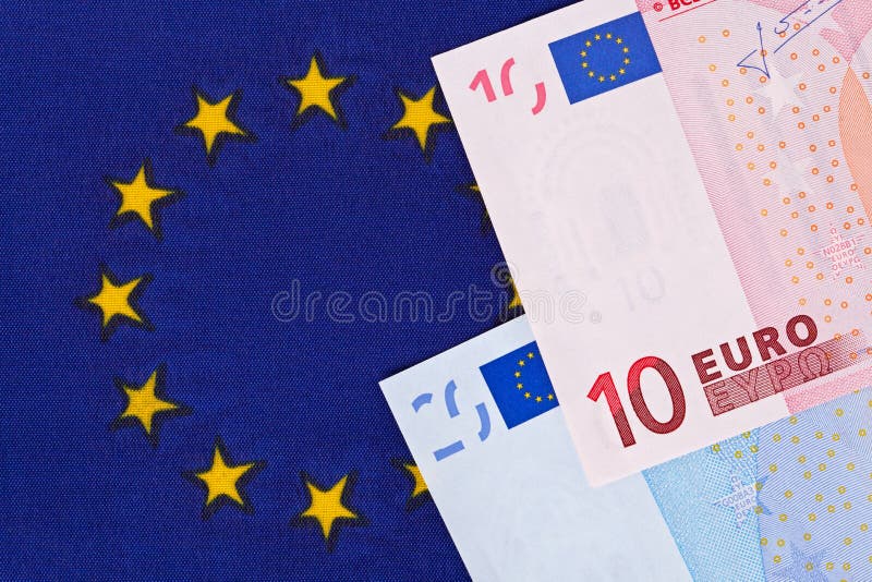 Euro or Euros banknotes on a European Union flag background. Euro or Euros banknotes on a European Union flag background