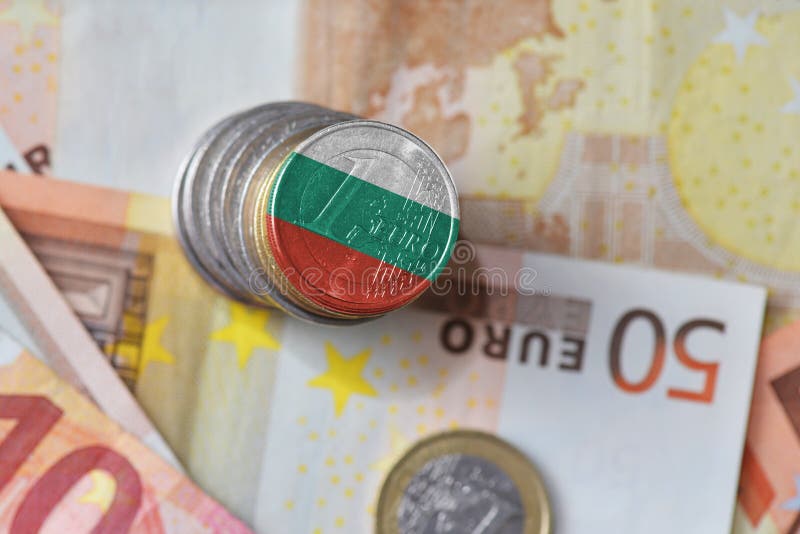 Euro coin with national flag of bulgaria on the euro money banknotes background