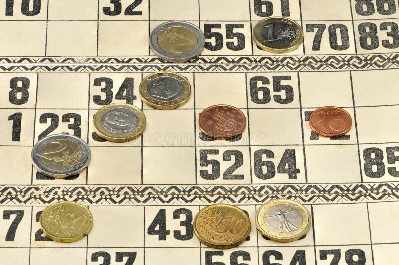 Euro coins on the cards for Russian lotto game stock photography