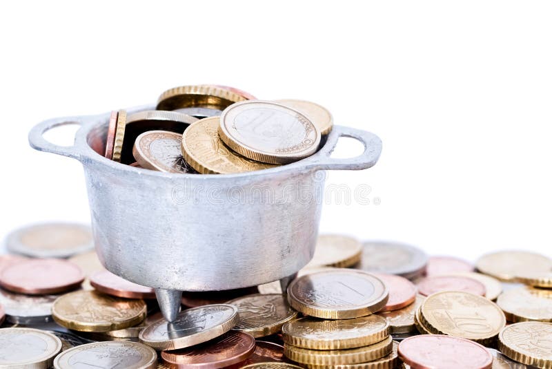 Euro coins in cauldron