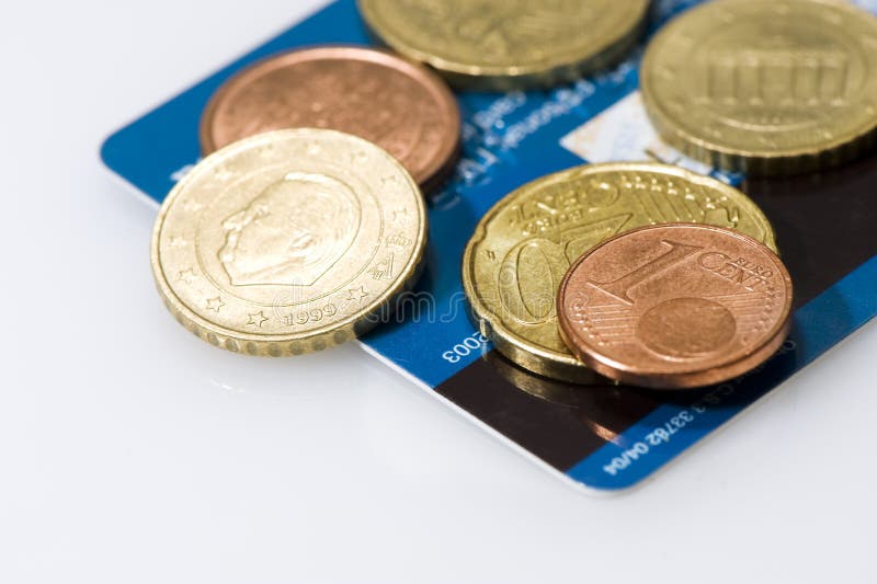 Euro coins on credit card