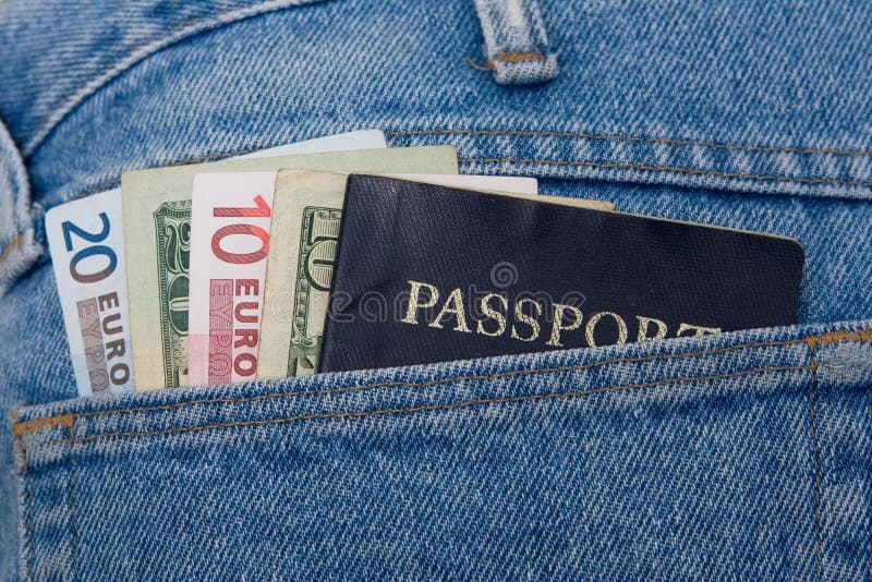 Money and passport in jeans back pocket. Money and passport in jeans back pocket