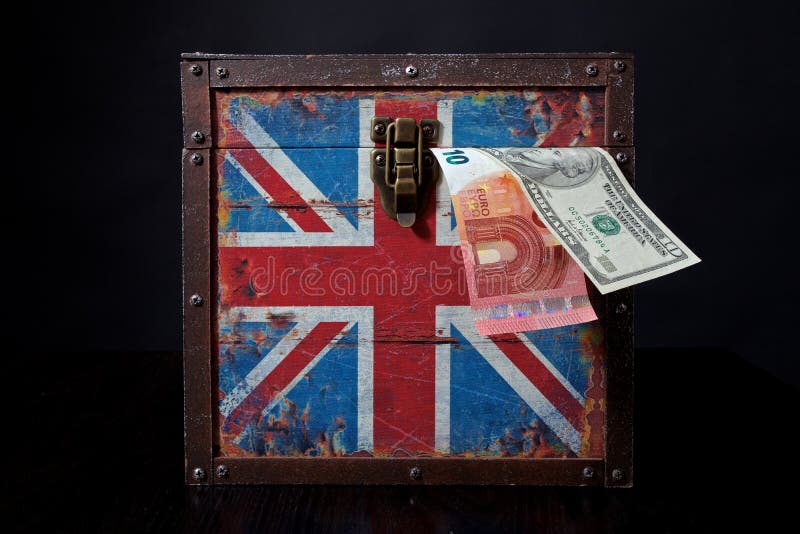 Euro banknote and american dollar on British flag. Euro banknote and american dollar on British flag