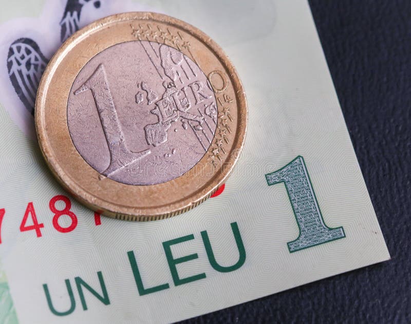 1 euro- moeda sobre 1 conta de RON do leu imagens de stock 1 euro- moeda sobre 1 conta de RON do leu imagens de stock