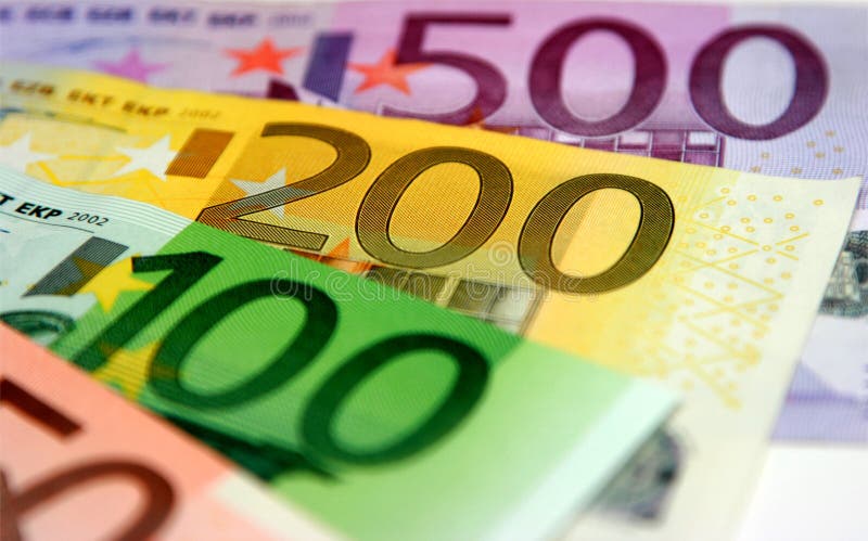 Euro banknotes, close-up with shallow depth-of-field; focus on the 200 Euro banknote. Euro banknotes, close-up with shallow depth-of-field; focus on the 200 Euro banknote