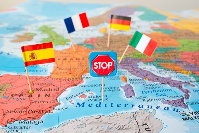 Europe lockdown concept image stop Coronavirus flags of Italy, Germany, France, Spain on map, travel restrictions border shutdown