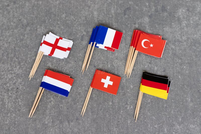 European Flags on Wooden Toothpicks Flatlay on Stone Background stock photography