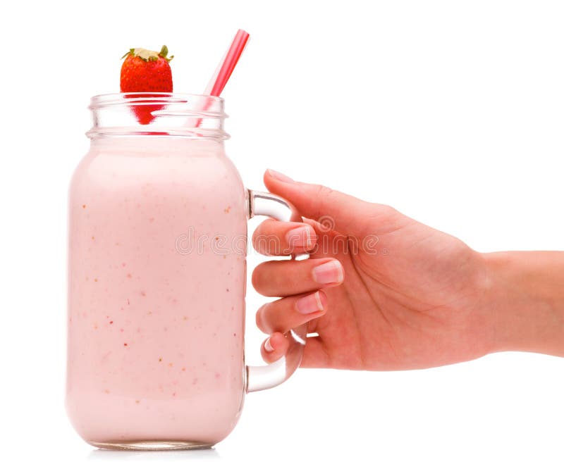 A Girl Is Holding A Jar With Strawberry Smoothies And With A Juicy 