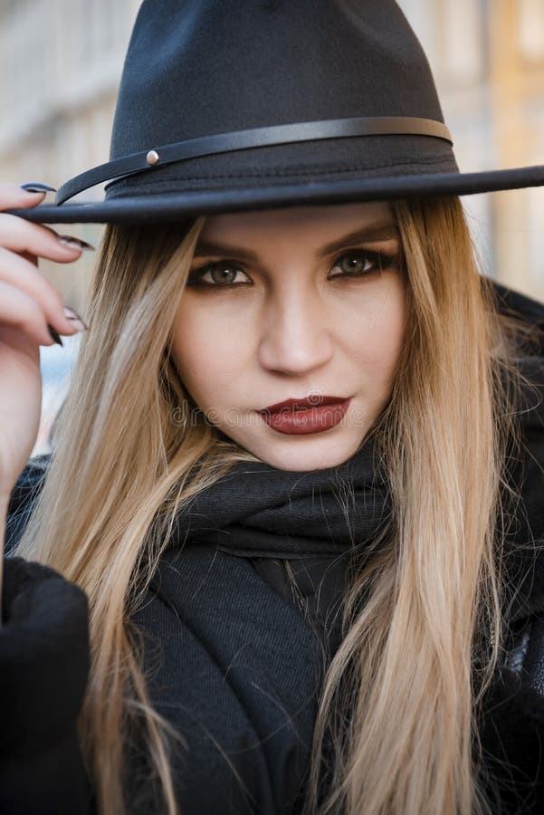 European Young Blonde Woman in Black Clothes and Hat Close Up Stock ...