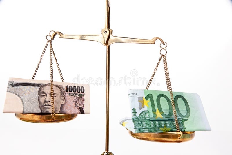 Japanese yen and European euro banknotes money on scales. Japanese yen and European euro banknotes money on scales