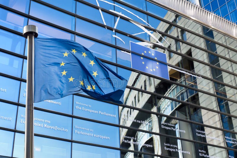 European Union flags in front of the European Parliament in Brussels, Belgium. European Union flags in front of the European Parliament in Brussels, Belgium