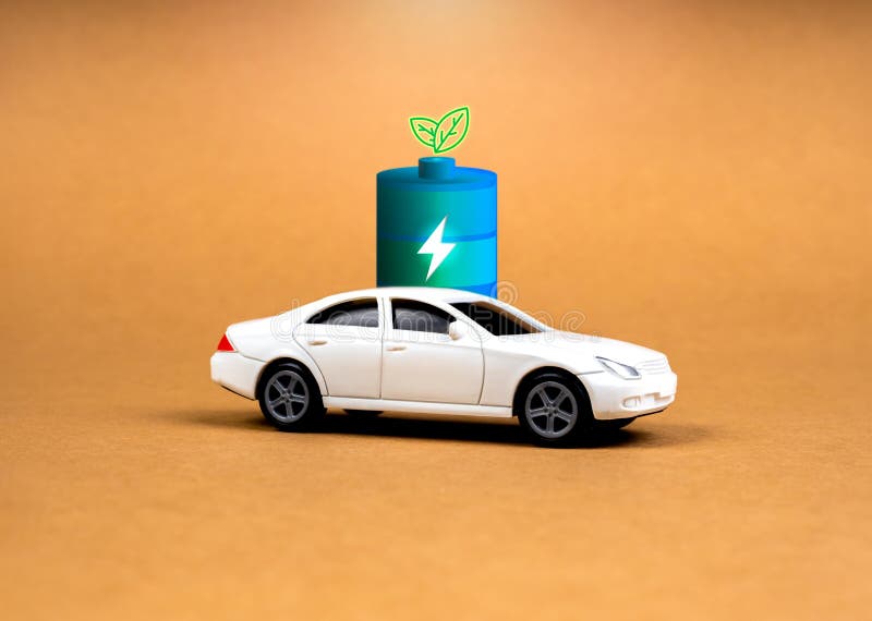 EV car, Electric energy battery charge vehicle with sustainable development concept. White toy car with 3d battery charge with green leaf icon, charging power energy on recycle paper background. Development ev stock images, royalty-free photos and pictures