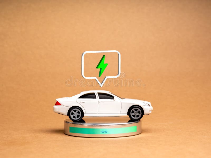 EV car, Electric energy battery charge vehicle with sustainable development concept. A White toy car with 3d electric power icon in speech bubble, recharging full energy on recycle paper background. Development ev stock images, royalty-free photos and pictures