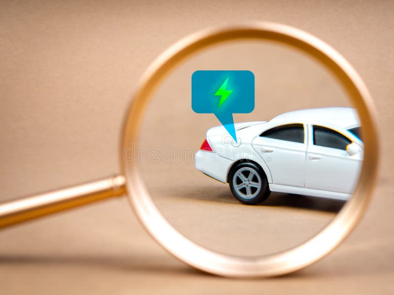 EV car searching, Electric energy battery charge vehicle with sustainable development concept. Green electric power energy icon in speech bubble on fuel tank cap cover of white car by magnifier lens. Development ev stock images, royalty-free photos and pictures