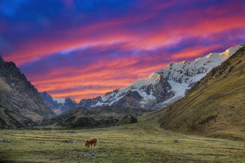 Evening in the Andes. Sunset in Andean mountains near Nevado Salkantay peak, Peru. HDR image Evening in the Andes. Sunset in Andean mountains near Nevado Salkantay peak, Peru. HDR image