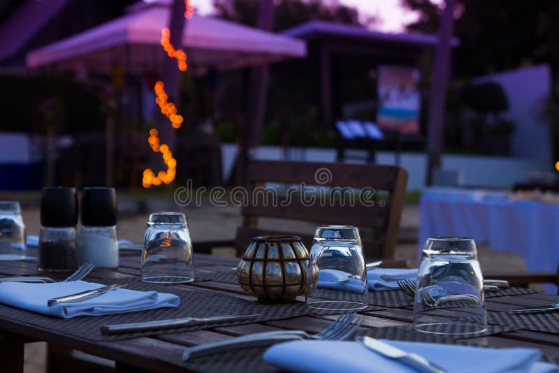 Evening beach dinner serving royalty free stock photo