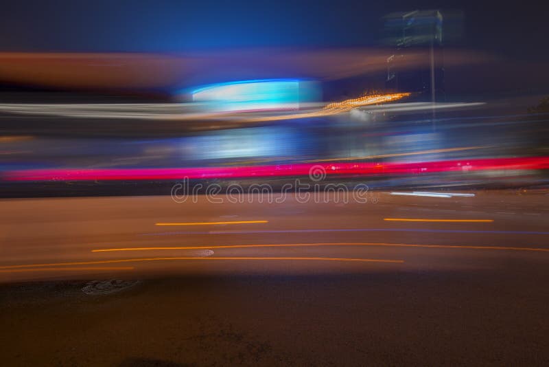In the evening, the city road light trails