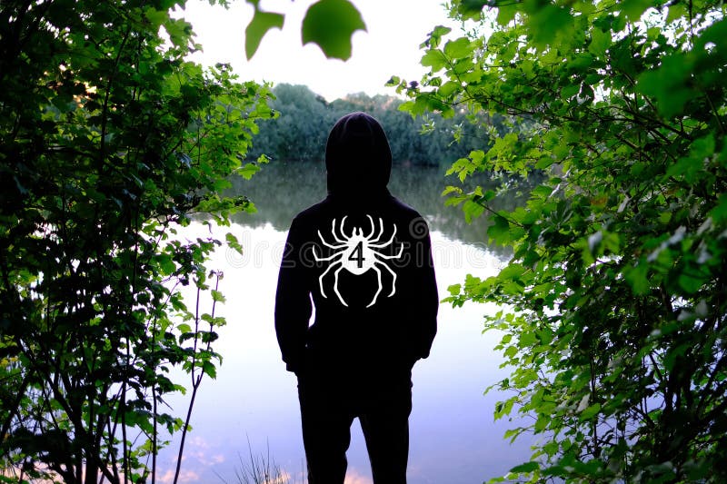 evening landscape with forest lake, river, back young man, teenager, intruder standing in black hood and looking pond, water