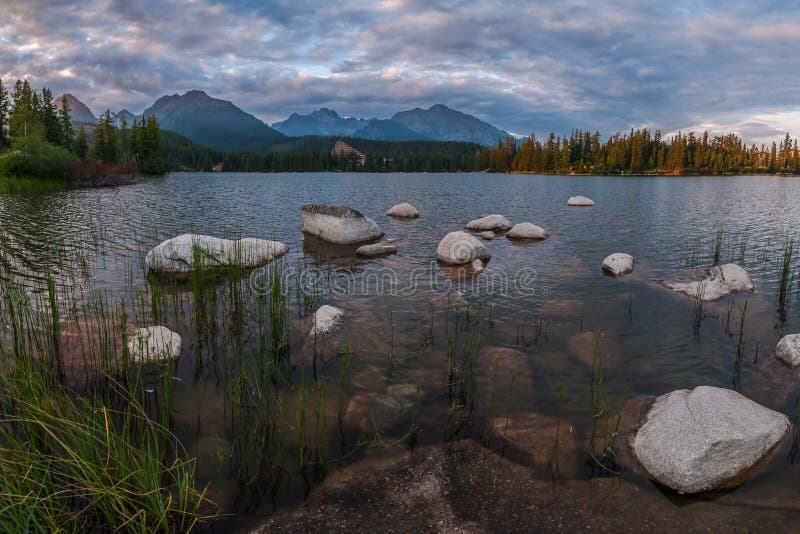 Evening landscape with lake and mountains