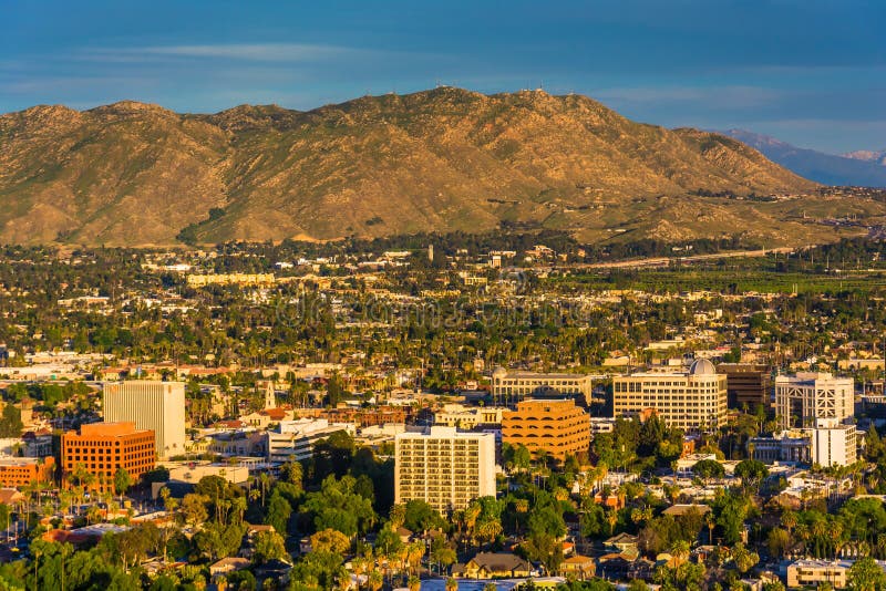 Evening light on on distant mountains and the city of Riverside stock image