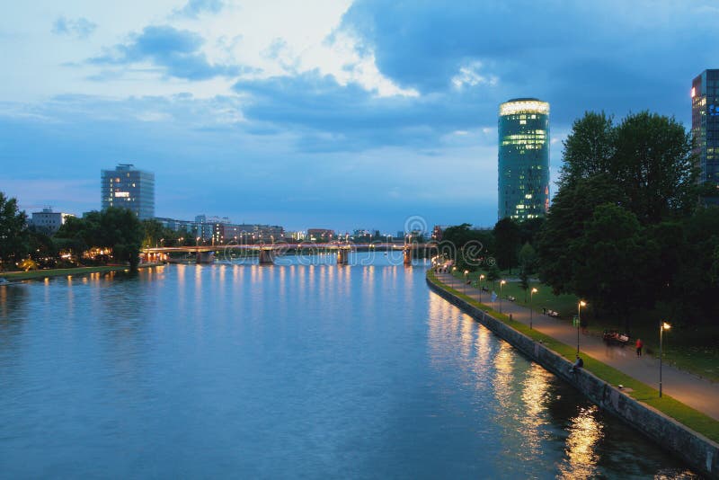 Evening river, bridge and city. Frankfurt am Main, Germany