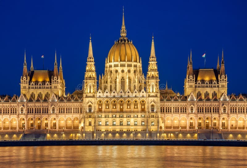 Evening view of the Hungarian Parliament Building on the bank of the Danube in Budapest, Hungary