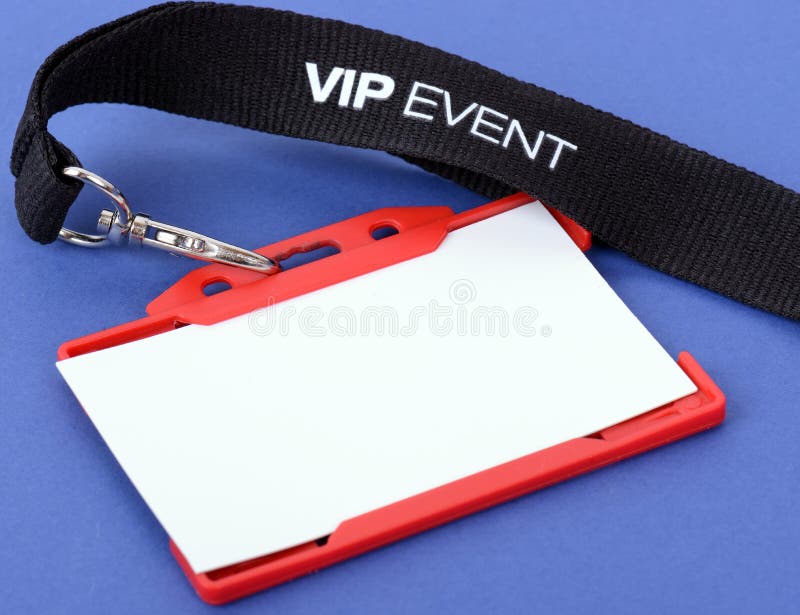 An id badge for a VIP event on a blue background, focuse on the vip text. An id badge for a VIP event on a blue background, focuse on the vip text