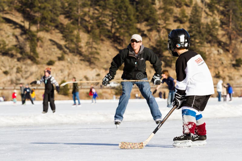Evergreen, Colorado-January 20, 2013:2012-2013 Winter Season. Ice skating on Evergreen Lake, Colorado.