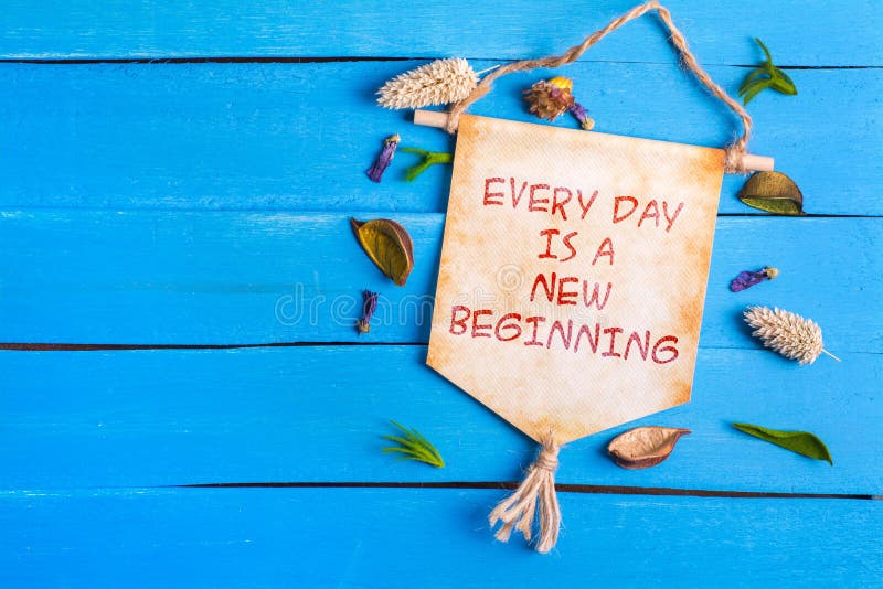 Every day is a new beginning text on Paper Scroll royalty free stock photo