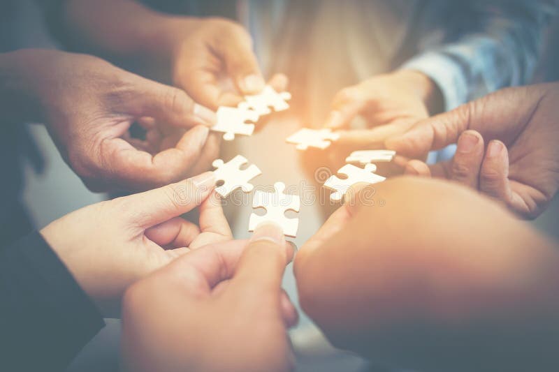 Everyone is an important jigsaw at work. stock photo Everyone is an important jigsaw at work. stock photo