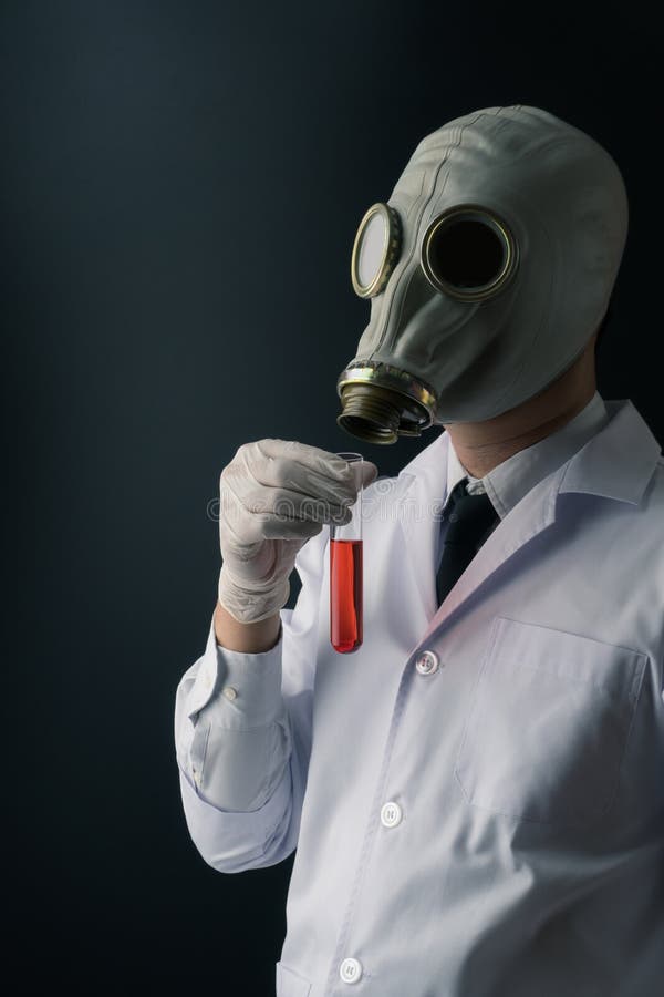 laboratory scene, the scientist holding the glass stirring rod