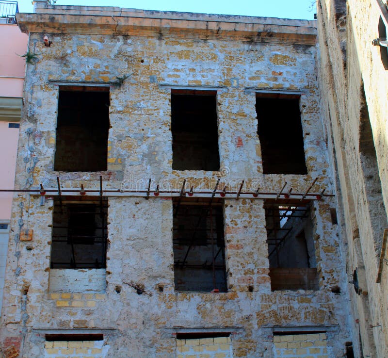 Facade of an ancient uninhabited building in the historic center of Palermo in Italy stock images Facade of an ancient uninhabited building in the historic center of Palermo in Italy stock images