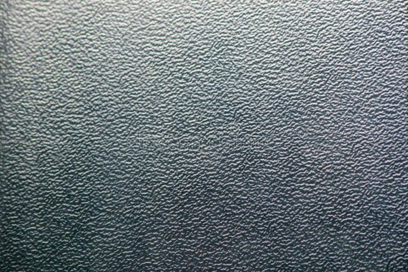 An example of the surface of embossed glass under natural sunlight. A blank for backgrounds, texts, design ideas, and on the topic stock illustration