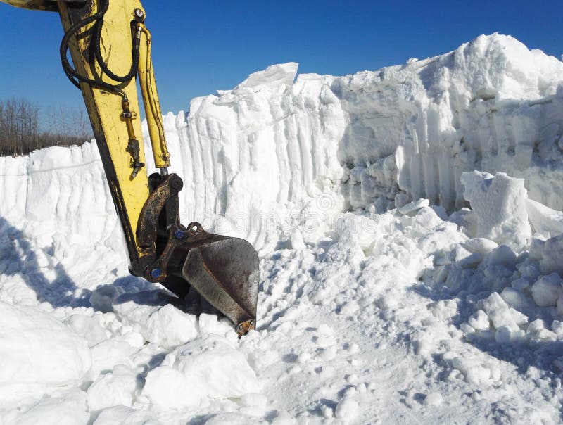 Excavator in snow stock photo. Image of digging, male 17488778