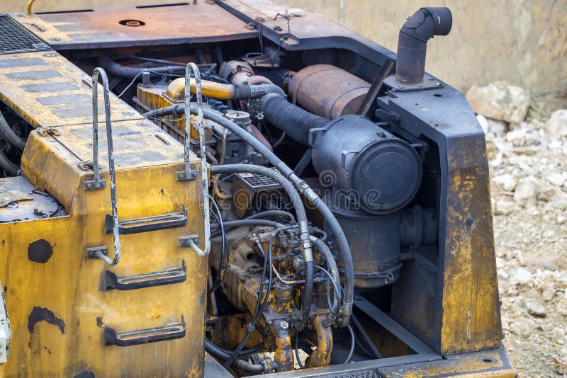 Excavator with dirty engine royalty free stock image