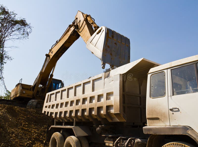 Excavator loader and truck