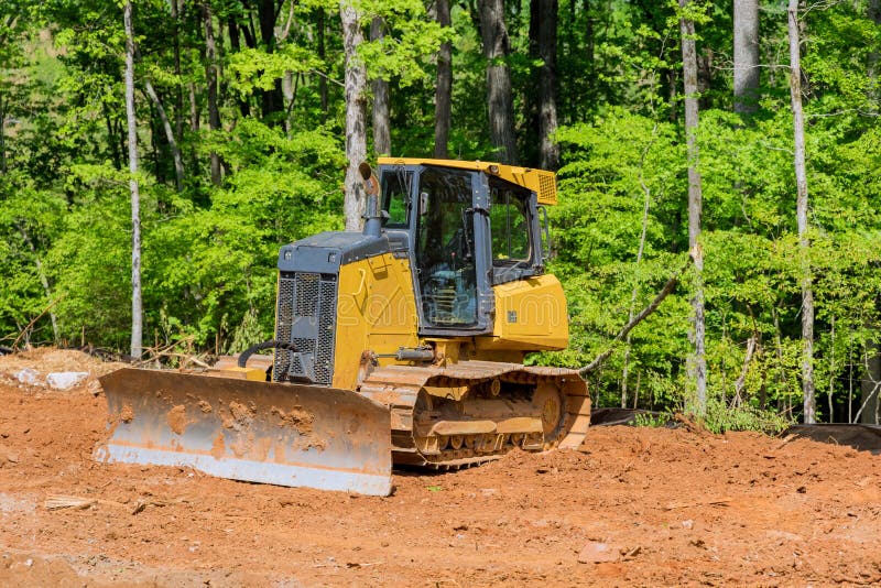 Excavators during Landscaping Works at Construction Site Stock Photo