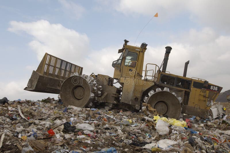 Excavator loader at dumping ground. Excavator loader at dumping ground