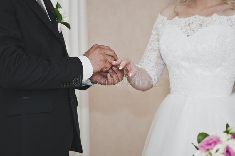The Exchange of Wedding Rings during the Ceremony 6814. Stock Photo