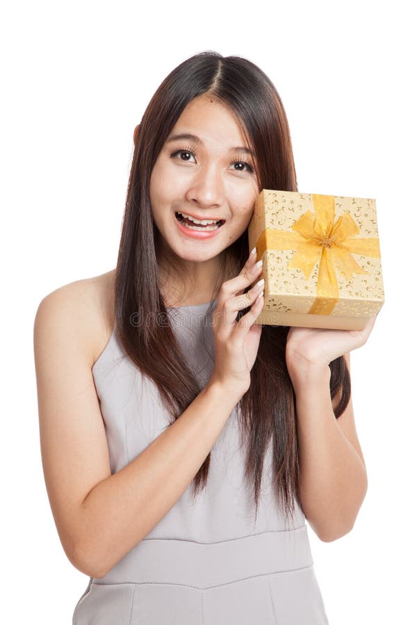 Excited Beautiful Young Asian Woman With Golden Gift Box Stock Photo ...
