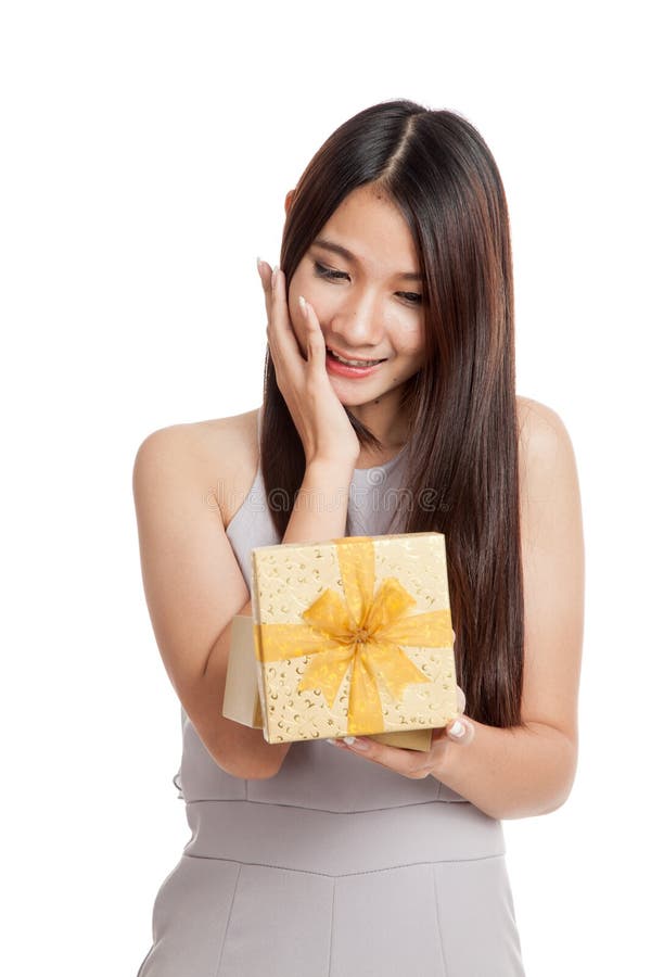 Excited Beautiful Young Asian Woman With Golden Gift Box Stock Photo ...