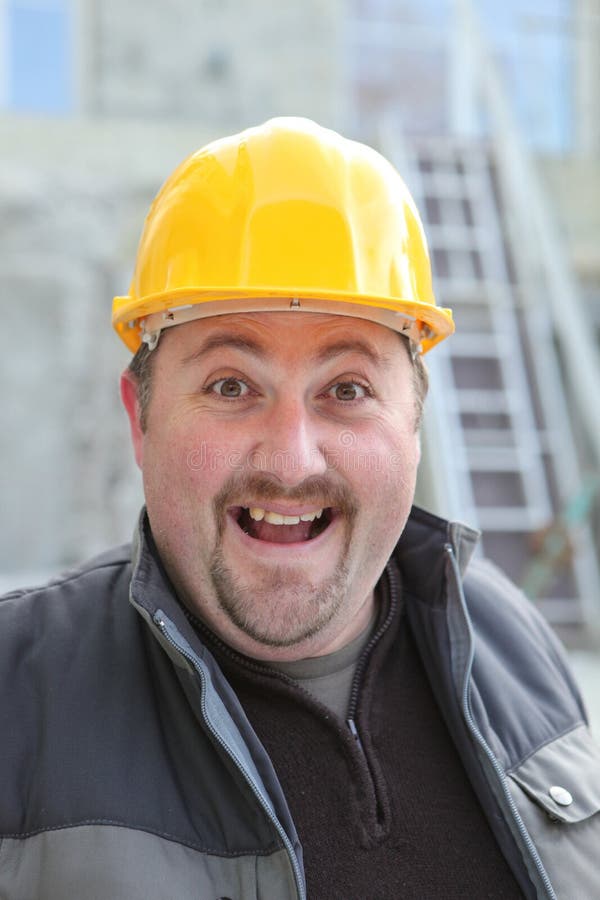 Excited chubby manual worker