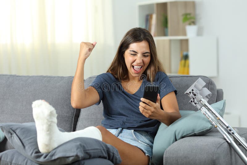 Excited disabled woman receiving online news royalty free stock photos Excited disabled woman receiving online news royalty free stock photos