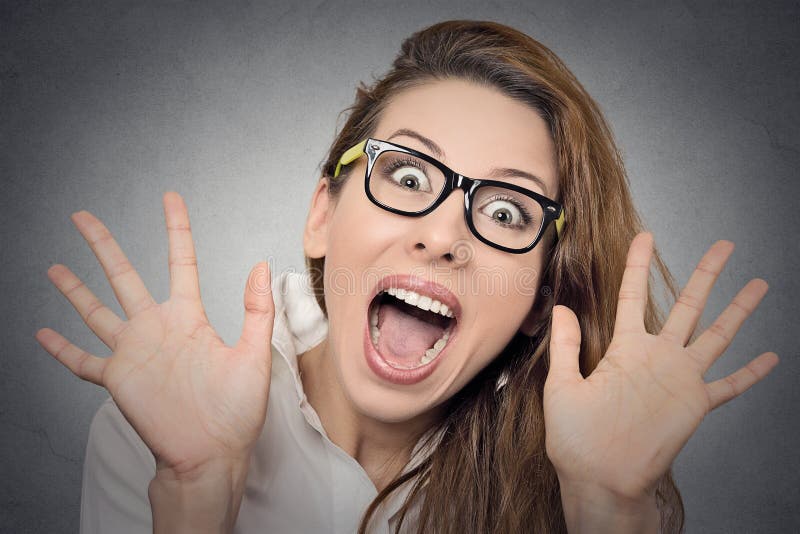 Portrait super excited girl, thrilled surprised woman with glasses and wide open mouth and eyes. Human face expression, feelings, life perception, vision, attitude