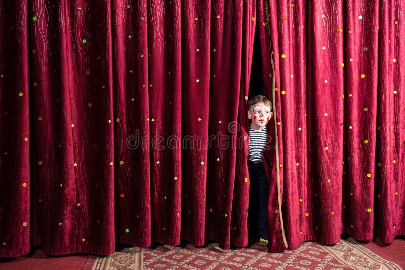 Excited little boy on stage